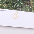 Close-up of minimalist gold geometric rhombus pendant for DIY jewelry making and crafts - Asymmetric Irregular Geometric Rhombus (13#)