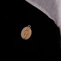 Detailed view of oval gold alloy Virgin Mary medallion pendant with engraved religious text - Matte Gold Mary Oval (16#)