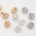 Detail of 14k gold plated hollow cage spacer beads with inlaid cubic zirconia - Hollow Sphere Style (5-Hao)
