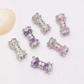 Detail view of 14K gold-filled pave zircon bowknot connectors for jewelry making - White Zircon / Silver Plated (Color Retention)