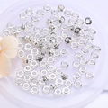 Polished silver color wheel spacer beads for DIY jewelry making on a white tray - Silver / 2.3x4mm