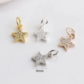 Macro view of 9mm star pendants with cubic zirconia inlay in gold and silver finishes - Star / 14K Gold