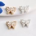 Detailed macro view of 14K gold-plated butterfly charms with inlaid cubic zirconia - Small Butterfly (White Zirconia)
