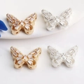 Macro shot of 14K gold butterfly beads with cubic zirconia for DIY jewelry making - Large Butterfly (White Zirconia)