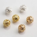 Detailed close-up of 10mm hollow floral patterned gold and silver DIY jewelry beads - Foliage Scroll Hollow (Style No.10)