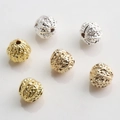 Detailed view of 10mm gold and silver hollow flower beads for DIY jewelry making - Hollow Relief Craft (Style No.15)