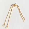 Macro shot of 14K gold filled box chain with adjustable silicone bead and zircon stones - 18K Gold