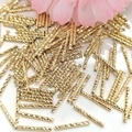 Macro detail of 14K gold filled curved tubes with spiral texture for jewelry making - Straight Tube (1.5x15) / 18k Gold Plated (Color Retention)