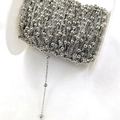 Macro view of silver satellite chain rolls with beads for DIY jewelry making - 3.5MM Bead Chain / White Gold