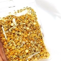 Dettaglio di perline distanziatrici sfaccettate placcate oro 18K in un sacchetto trasparente - Incisione Fronte-Retro / 6mm / Oro 18K