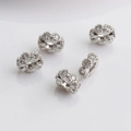 Macro shot of five silver rhodium plated spacers with cubic zirconia for DIY jewelry - 12mm Large Hole Spacer Bead / Silver Plated (Color Retention)