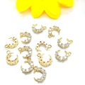 Detailed view of 14K gold-plated crescent moon charms with micro-paved cubic zirconia gems - Gold Single Loop Moon