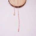 Detailed close-up of rose gold box chain with lobster clasp and adjustable extension link - Rose Gold