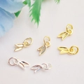 Macro shot of gold and silver rabbit ear leaf pendants for DIY jewelry making accessories - 14k Gold Color Preserved / Design No.5