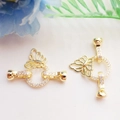Close-up of 14K gold plated butterfly jewelry clasp with micro-set cubic zirconia stones - Butterfly Design / 14K Gold