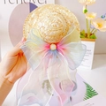 Detail of pet straw hat with large rainbow organza bow and white pearl center - Blue Pink Yellow Ribbon Hat