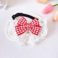 Close-up of houndstooth pet bow tie with pearl pendant and delicate white lace trim - XS / Houndstooth