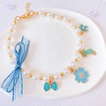 Handmade pearl pet necklace with blue enamel bow and cat charm for small dogs and cats - XS / Blue Necklace