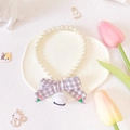 Detail of white faux pearl pet collar with grey plaid bowknot and embroidered red flower - White Bell Gray Plaid