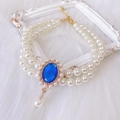 Double-layer pearl pet necklace featuring a large blue gemstone and gold lobster clasp - Size XS / Blue Faux Gemstone