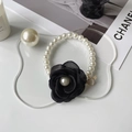 Elegant pet pearl necklace with a black camellia flower and winged heart pendant - XS / Black Pearl Flower