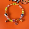 Halloween pet necklace with pumpkin charm, colorful beads, bells and spooky skull motifs - Halloween Necklace Style 5