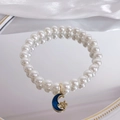 Elegante parelhalsband voor katten met gouden maan en blauwe sterhanger variant - XS / Ster Maan Stijl