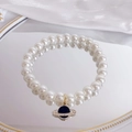 Elegante parelhalsband voor huisdieren met een blauwe sterren Saturnus hanger - XS / Saturnus Stijl
