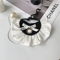 Elegant black knit pet bib with white satin ruffle and decorative camellia pendant - One Size / Black Bib with Flower Pendant