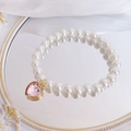Collar elegante para gato con perlas blancas y un colgante de corazón de cristal rosa - Talla XS (0,5-1,5 kg) / Corazón Rosa Claro