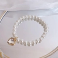 Elegante collar de perlas para gato con colgante de corazón de cristal en acabado oro - Talla XS (0,5-1,5 kg) / Heart Transparent