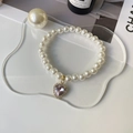 Elegant pet pearl necklace featuring a purple heart-shaped pendant with a gold clasp - XS / Pink Zirconia Heart Style