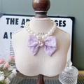 Elegant pearl cat collar with a purple fabric bow and pink heart crystal pendant - XS / Purple