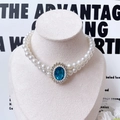 Double-layer pearl pet necklace featuring an oval blue gemstone and crystal border - XS / Lake Blue