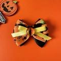 Halloween pet bow collar with pumpkin patterns, bat wings, and amber dragon eye detail - Orange Bow With Eye (No Bell)