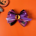 Halloween pet bowtie featuring purple ribbons with spooky eye and pumpkin patterns - Purple Bow With Eye (No Bell)