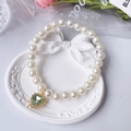 Pet pearl necklace with a light green crystal heart pendant and zircon borders - Pale Green