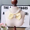 Elegant pet pearl necklace with bright yellow ribbon bow and heart pendant charm - XS / Cream Yellow Bow