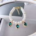 Sparkling pet pearl collar with emerald-green gemstone pendants and gold finish details - Olive Green