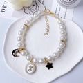 Pet pearl necklace with black moon and star charms and golden floral pendant accessory - XS / White Rose Pearl Chain