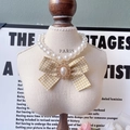 Sweet pet pearl necklace featuring a yellow checkered bow and sparkling rhinestone detail - Yellow Gingham with Bow