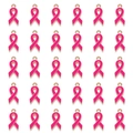 Macro view of 30 pink ribbon alloy charms with gold plating for DIY jewelry making - Rose Red