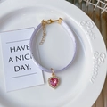 Light purple satin pet choker featuring a pink crystal heart pendant with gold hardware - Rhinestone Heart Purple