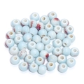 Detailed view of light blue 10mm ceramic beads with red-brown floral ink patterns - Light Blue With Red Flower