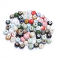 Macro shot of colorful glazed ceramic beads for DIY jewelry making with marble texture - Mixed Random Pattern