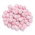 Macro shot of light pink gradient ceramic beads with smooth glazed finish for DIY jewelry - Light Pink Gradient