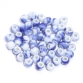 Macro shot of blue and white glazed ceramic round beads for DIY jewelry making - Blue And White Porcelain Style