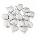 Macro view of silver starfish pendants with textured grooved surface for jewelry making - 10 Pieces Pack / Steel Color Scallop