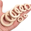 Detailed set of smooth natural wood rings in various sizes for DIY craft and accessories - 70mm Thickness 12mm / Natural Wood Color
