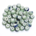 Light green ceramic round beads with deep blue ink splash pattern for DIY jewelry - Light Green Ink Pattern